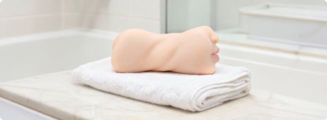 Schoon Onahole op een handdoek